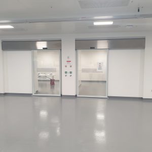 Hygienic glass sliding doors in a medical centre.
