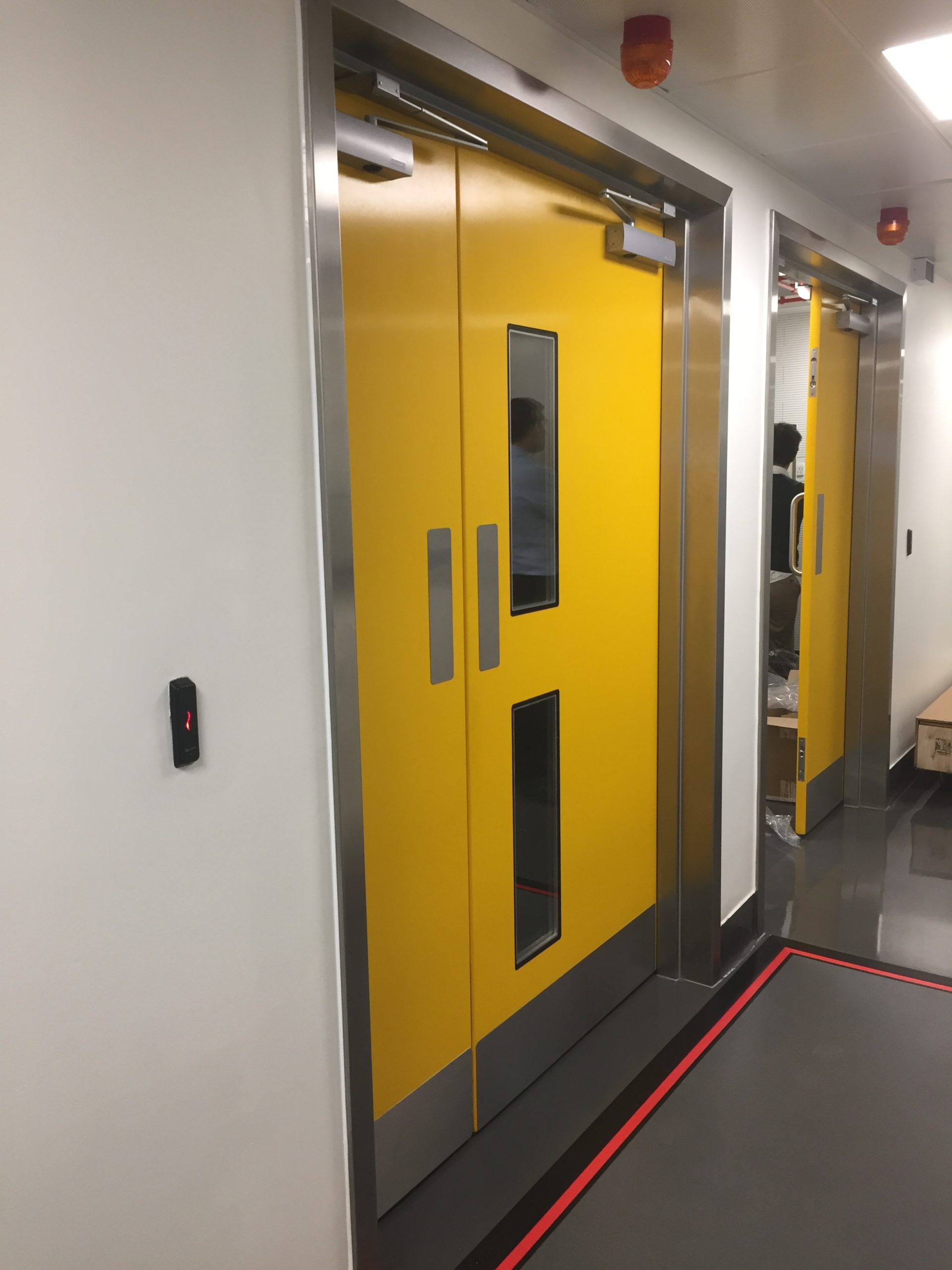 Yellow coloured door installation.