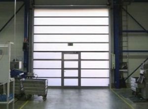 A Butzbach Sectiolite Door in a busy warehouse.